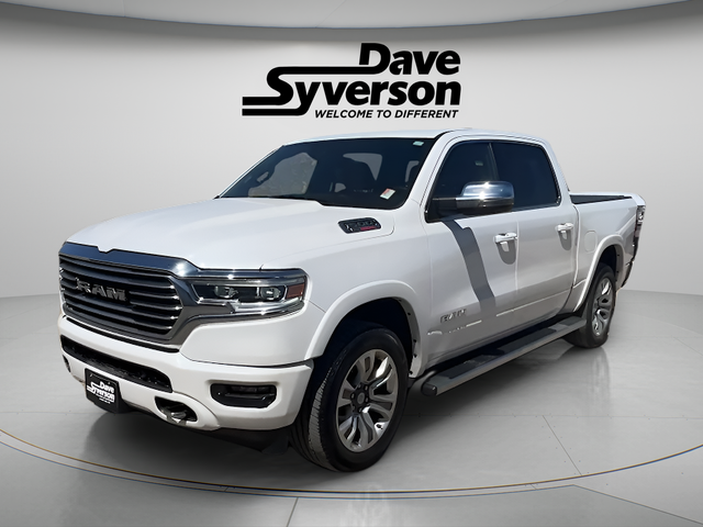 2023 RAM 1500 Limited in Ivory White Tri-Coat Pearlcoat — front three-quarter view